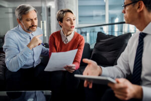 Reasonable Cause Definition: What It Means in Arrest and Search Cases 3 Attorney meeting with a client to discuss legal options.