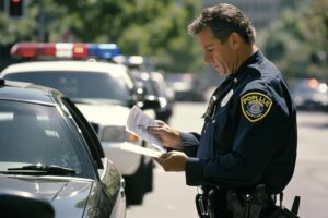 Wrongful Death Lawsuit Against Police: How Families Can Seek Justice 2 Law enforcement officer stopping a vehicle during a traffic stop.