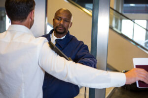 Can You Sue a Cop Personally? What California Law Allows 1 Security guard frisking a passenger at airport terminal
