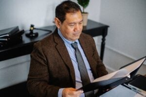 Qualified Immunity for Police Officers: What It Is and How It Affects Your Rights 2 An attorney reviewing case law and legal documents to challenge a police officer's qualified immunity defense