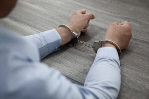 Examples of Civil Rights Violations by Police and What You Can Do 1 Person in handcuffs during a legal arrest situation