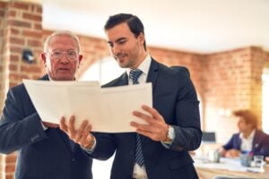 Protection Against Unreasonable Searches and Seizures: Know Your Constitutional Rights 2 Lawyer speaking with a client during a consultation